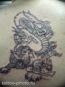 фото тату тигр и дракон 07.12.2018 №047 - tattoo tiger and dragon - tattoo-photo.ru